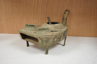 A Chinese Han Dynasty bronze brazier and vessels, width 22.5cm., Condition - spout has cracks to end